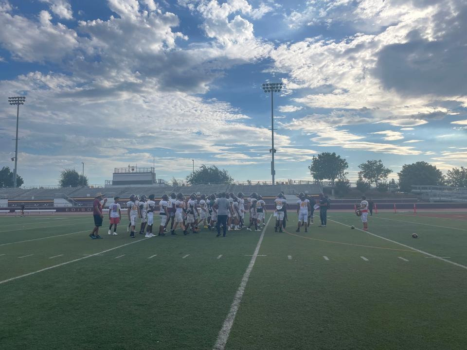 Edison football varsity team dispersing from a team huddle at one of practices. The Vikings will start their season on Aug. 19 vs. Central.