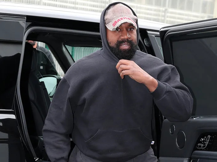 Kanye West arriving at the Balenciaga show for Paris Fashion Week