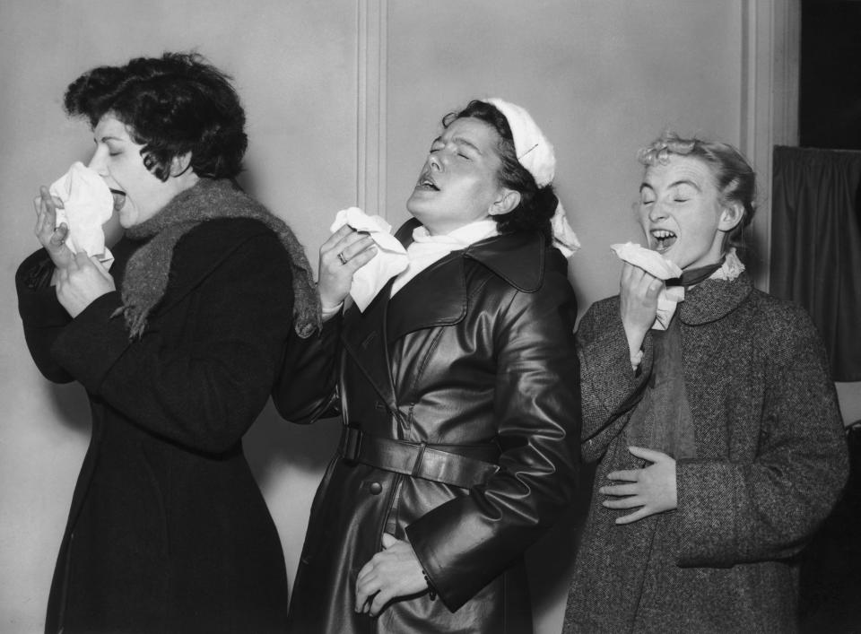 <h1 class="title">flu-sneeze-ladies</h1><cite class="credit">Photo by FPG/Hulton Archive/Getty Images</cite>