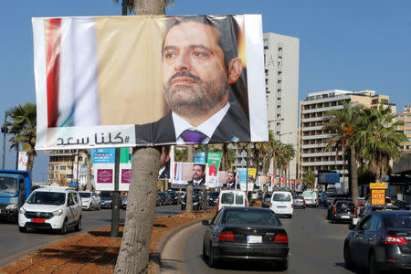 Posters depicting Lebanon's Prime Minister Saad al-Hariri, who has resigned from his post, are seen in Beirut, Lebanon, November 10, 2017. REUTERS/Mohamed Azakir