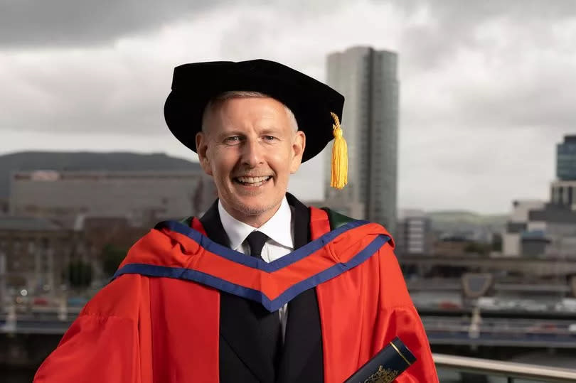 Patrick Kielty graduated from Ulster University on Monday with an Honorary Doctorate award -Credit:Nigel McDowell/Ulster University