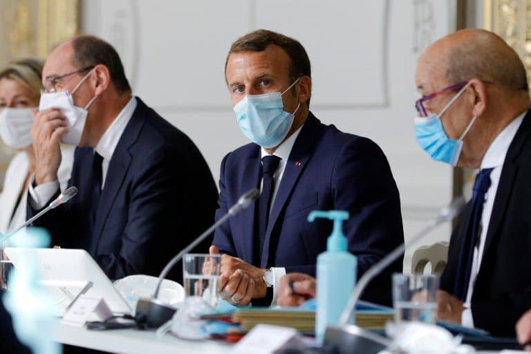 Jean castex, Emmanuel Macron et Jean-Yves le Drian, le 26 août 2020 à l'Elysée - Kamil Zihnioglu © 2019 AFP