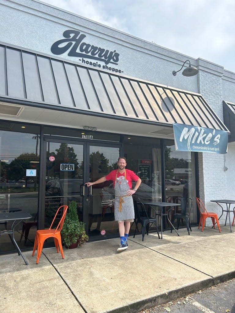 The new storefront for Harry's Hoagie Shoppe, located at 1700a E. North Street, and co-owner Andrew Fallis.