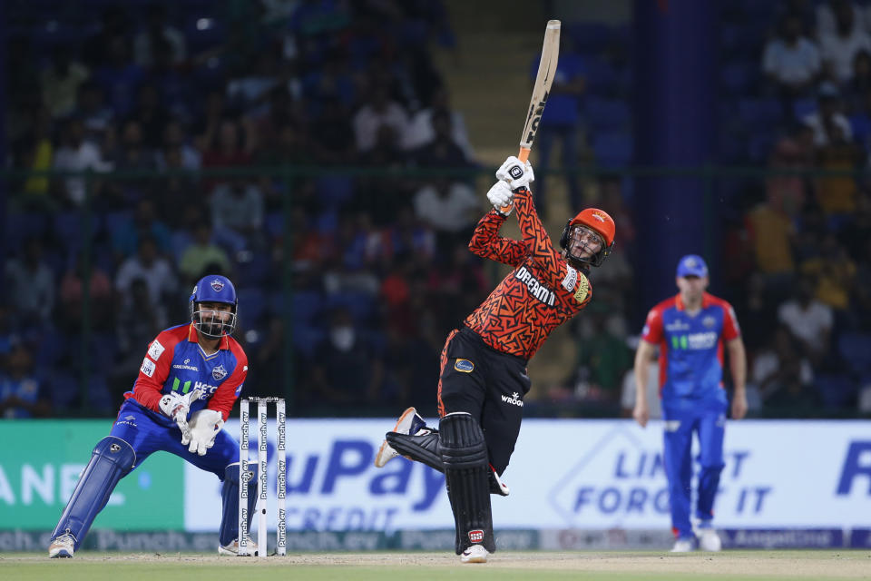 Sunrisers Hyderabad's Abhishek Sharma plays a shot as Delhi Capitals' captain Rishabh Pant watches during the Indian Premier League cricket match between Delhi Capitals and Sunrisers Hyderabad in New Delhi, India, Saturday, April 20, 2024. (AP Photo/Surjeet Yadav)