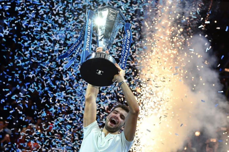 Bulgaria's Grigor Dimitrov celebrates winning the ATP World Tour Finals