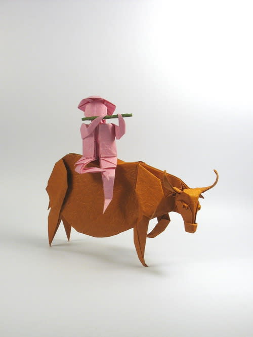 Boy on Water Buffalo. I made them for VOG's Year of the Buffalo contest. The boy was folded from one uncut square and the flute was from another paper.