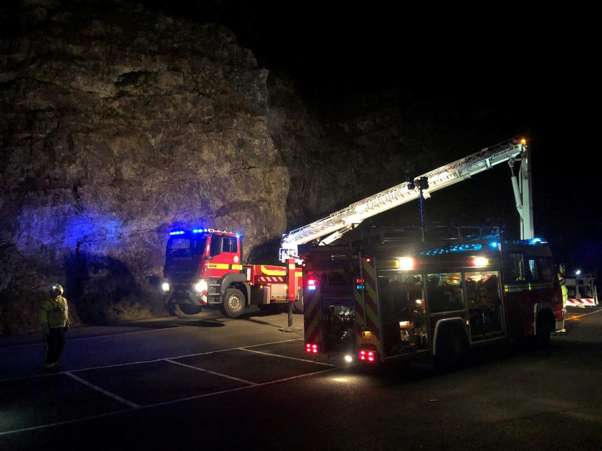 Emergency services on the scene at m Cheddar Gorge in Somerset on Sunday after two people became stuck on top of the cliffs. (SWNS)