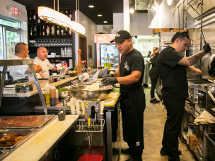 Staff at Bruno's restaurant in Fort Myers at a charity event in 2019. The restaurant opened in 2014 and its owners now want to convert the city fire station at MLK and Central Avenue to a restaurant with upscale shops and live and work apartments.