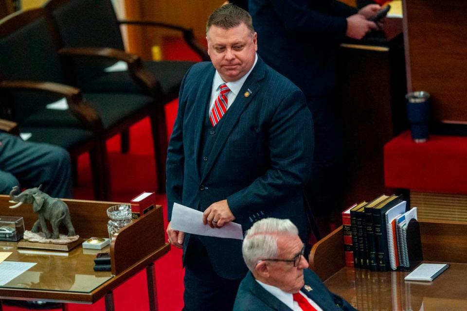 Rep. Jason Saine walks to his desk after speaking in the House chamber Wednesday Jan. 13, 2021 at the North Carolina General Assembly.