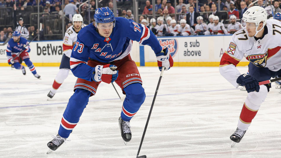 New York Rangers center Matt Rempe (73) skates on the ice while Florida Panthers defenseman Niko Mikkola (77) defends during the second period of the second game of the Eastern Conference Final of the 2024 Stanley Cup Playoffs at Madison Square Garden.