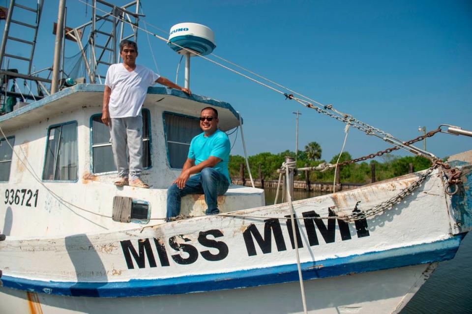 Elvis Ta and his father Sau Truong on Truong’s shrimping boat, Miss Mimi, at Bayou Caddy in Bay St. Louis on Thursday, June 29, 2023. Troung wanted Ta to go to school and get a good job. Ta now works a 9-to-5 at the Department of Agriculture.