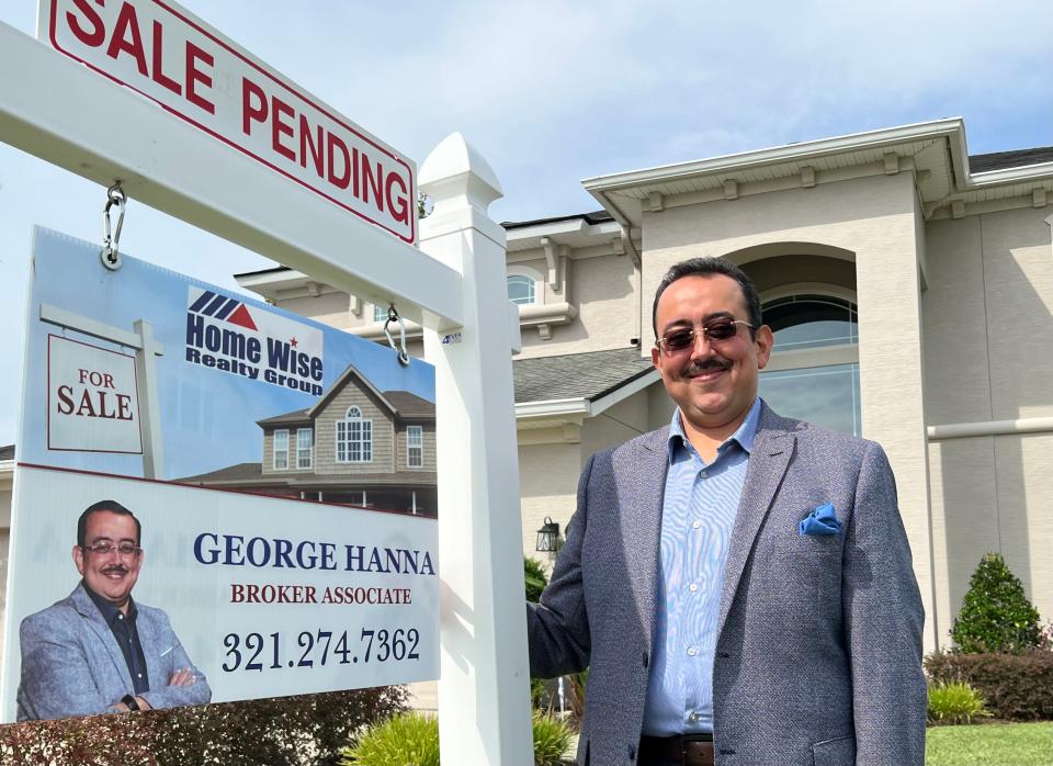 Realtor George Hanna of Home Wise Realty Group stands in front of a single-family house in Port Orange's Waters Edge community that was put under contract in August just four days after he listed it. The house, pictured on Tuesday, Sept. 19, 2023, is set to close on Friday.