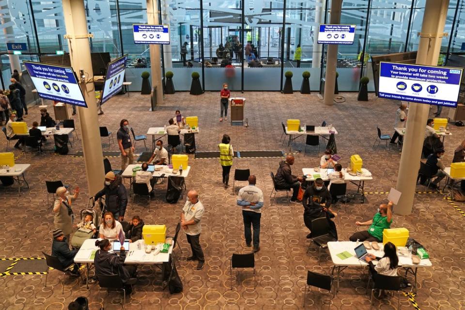 Staff at a vaccination centre at Wembley Stadium (Kirsty O’Connor/PA) (PA Wire)