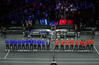 Team Europe players and Team World players line up during the opening ceremony of the Laver Cup tennis tournament at the O2 in London, Friday, Sept. 23, 2022. (AP Photo/Kin Cheung)