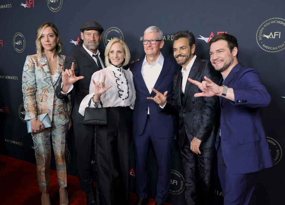 (L-R) Sian Heder, Troy Kotsur, Marlee Matlin, Tim Cook, Eugenio Derbez, and Daniel Durant attend the AFI Awards Luncheon at Beverly Wilshire, A Four Seasons Hotel in Beverly Hills, California.