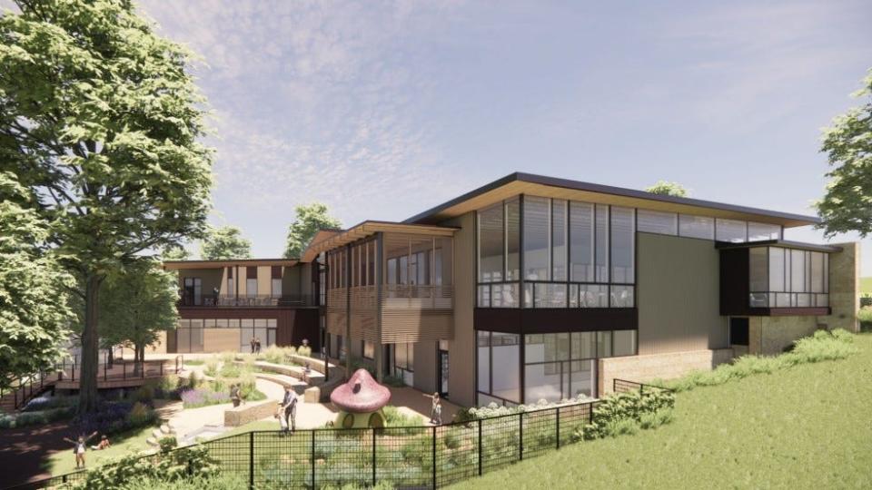 A rendering shows the northeast view of the Bee Cave Public Library.