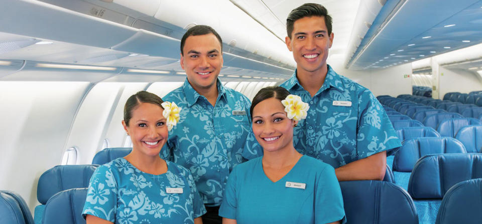 Today's Hawaiian Airline's flight attendants, looking fly as ever with a touch of aloha.