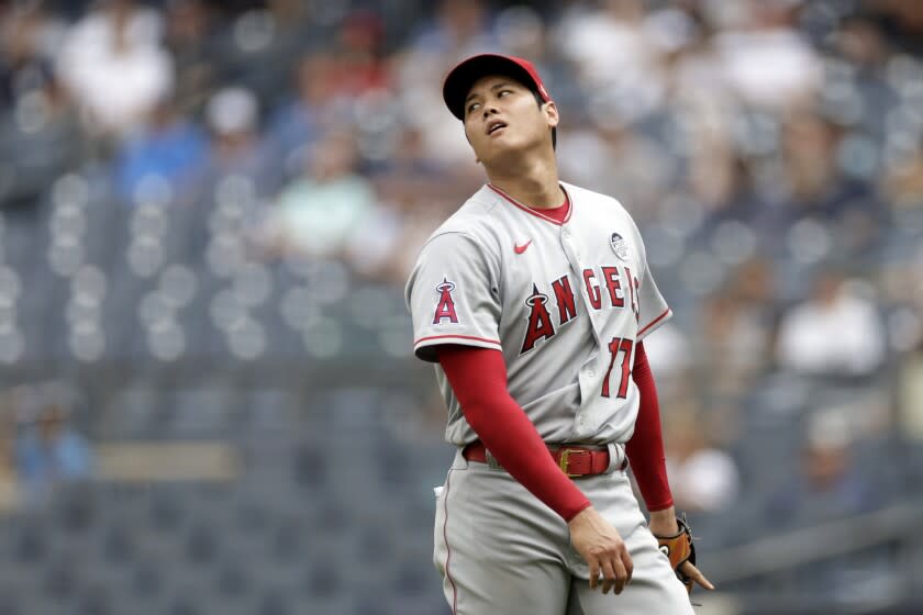 Los Angeles Angels pitcher Shohei Ohtani (17) reacts during the third inning of the first baseball game of a doubleheader against the New York Yankees on Thursday, June 2, 2022, in New York. (AP Photo/Adam Hunger)