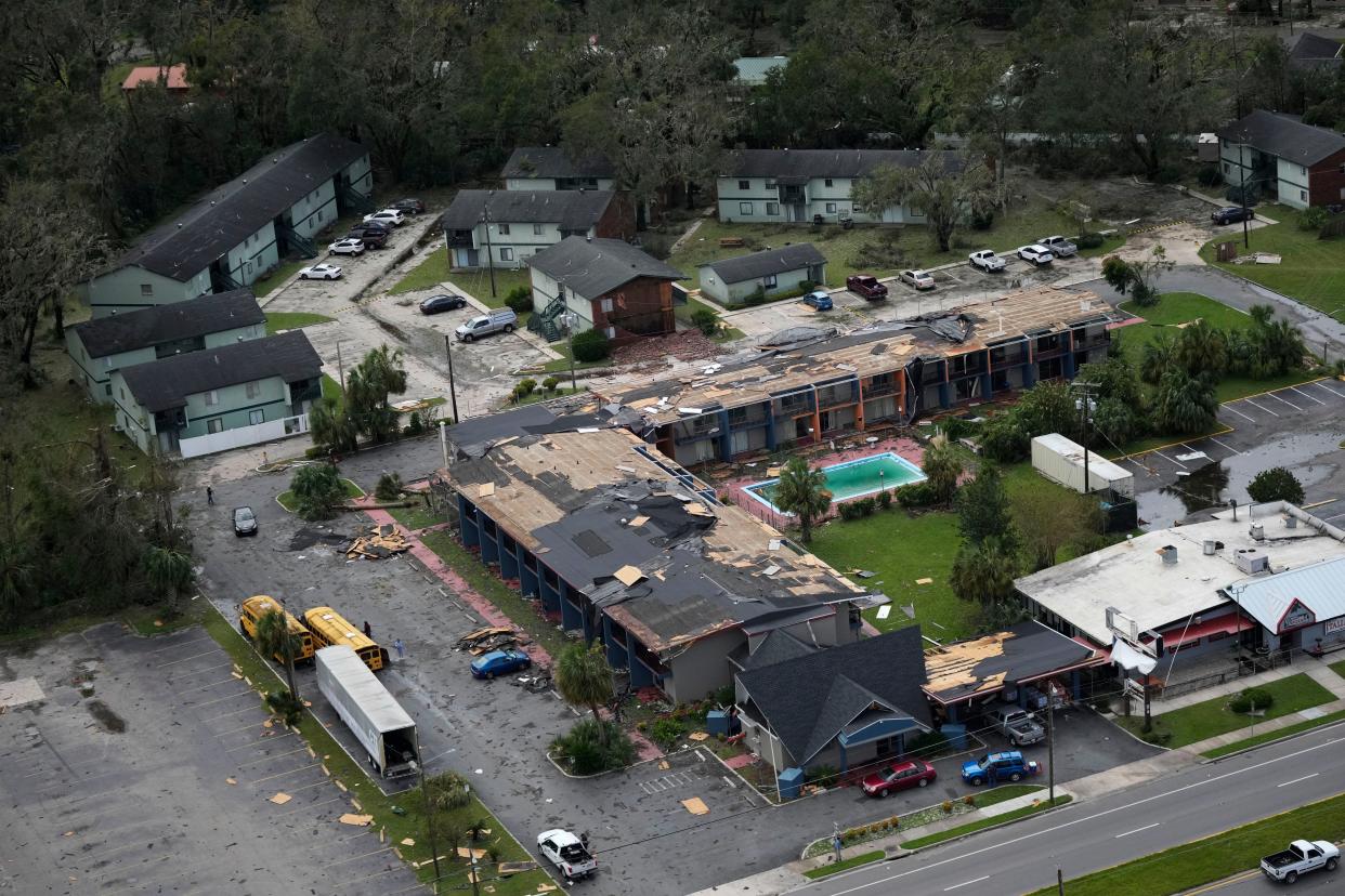 Debris is littered around the damaged Regency Inn Perry in Perry, Fla., following the passage of Hurricane Idalia, Wednesday, Aug. 30, 2023 (Copyright 2023 The Associated Press. All rights reserved.)