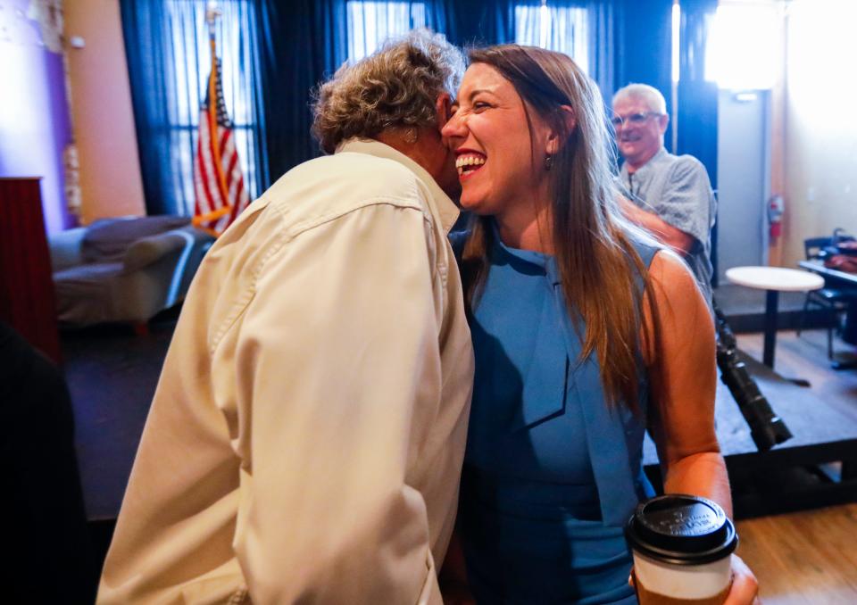 Crystal Quade, the Missouri House Minority Leader and Democratic representative for District 132, hugs Dave Coonrod after she announced her run for governor of Missouri in 2024 on Monday, July 10, 2023.