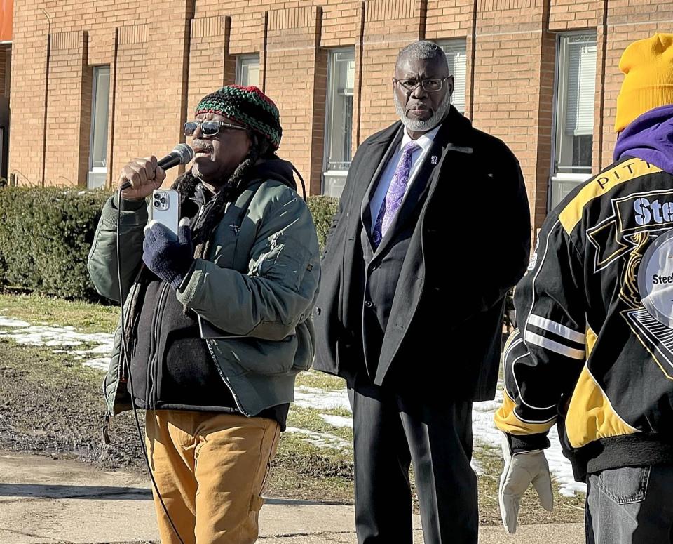 From left, Gary Horton, president of Erie's NAACP branch and James Sherrod, executive director of the MLK Center in Erie during the Martin Luther King Jr. Day march in Erie Monday afternoon.