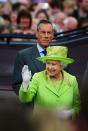 <p>Well, you definitely can’t miss this gold adorned green suit and matching hat. [Photo: Getty] </p>