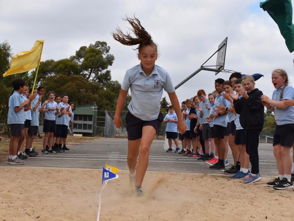 A pupil competes at Thursday’s annual Sports Day. Source: St James’ Parish School
