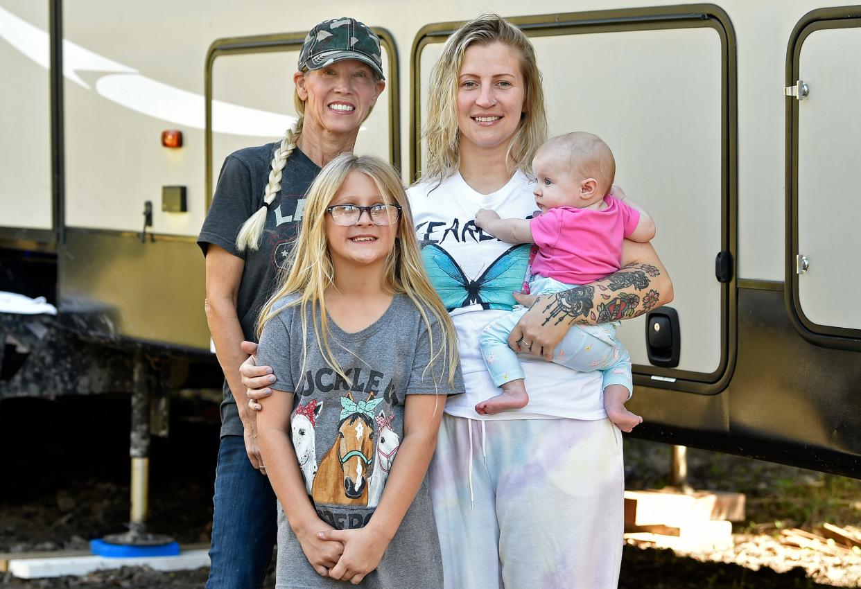 Olivia McLees, 31, with daughters 6-month-old Alauna McLees and Addalyn O'Leary, 9, and grandmother Susan Kucia, 60. The family lost almost everything after Hurricane Ian.