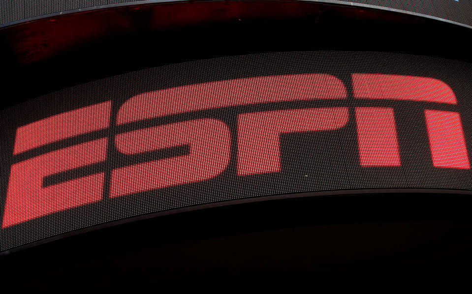 The ESPN logo is seen on an electronic display in Times Square in New York City, U.S., August 23, 2017.  REUTERS/Mike Segar