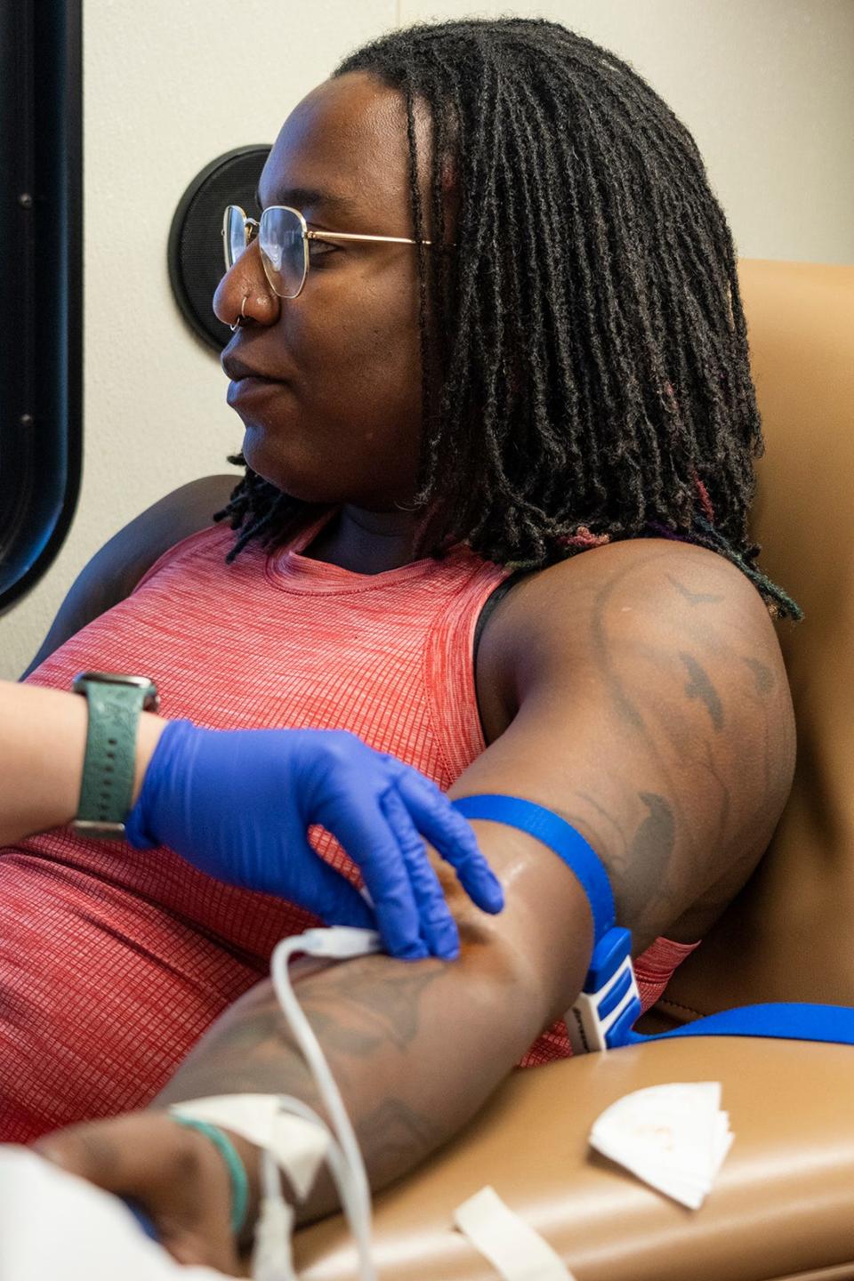 Setia Lewis donates blood for We Are Blood during a mobile drive in June. Now the sexual history questions posed to donors are the same for all men and women.