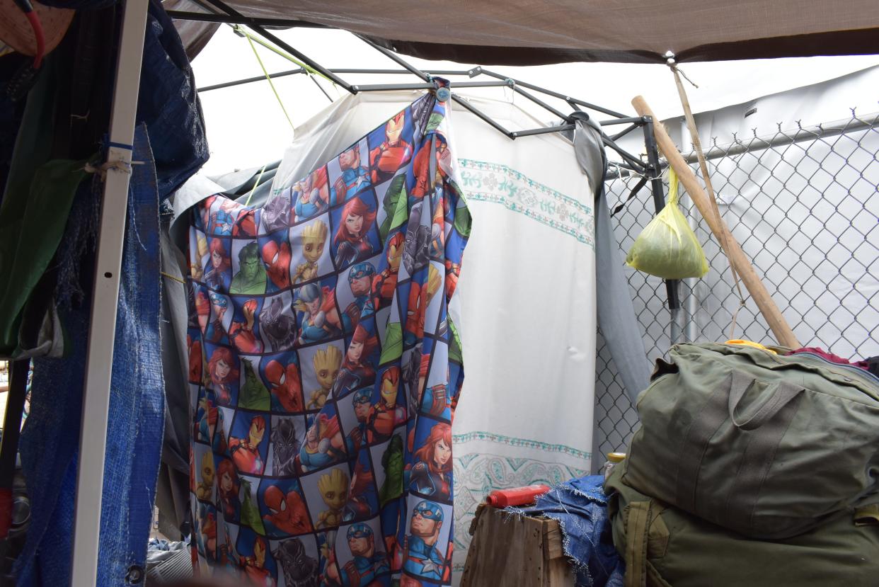 An outside view of the makeshift shower Bianca Farias built in the Zone, a blocks-large homeless encampment near Phoenix's Human Services Campus.