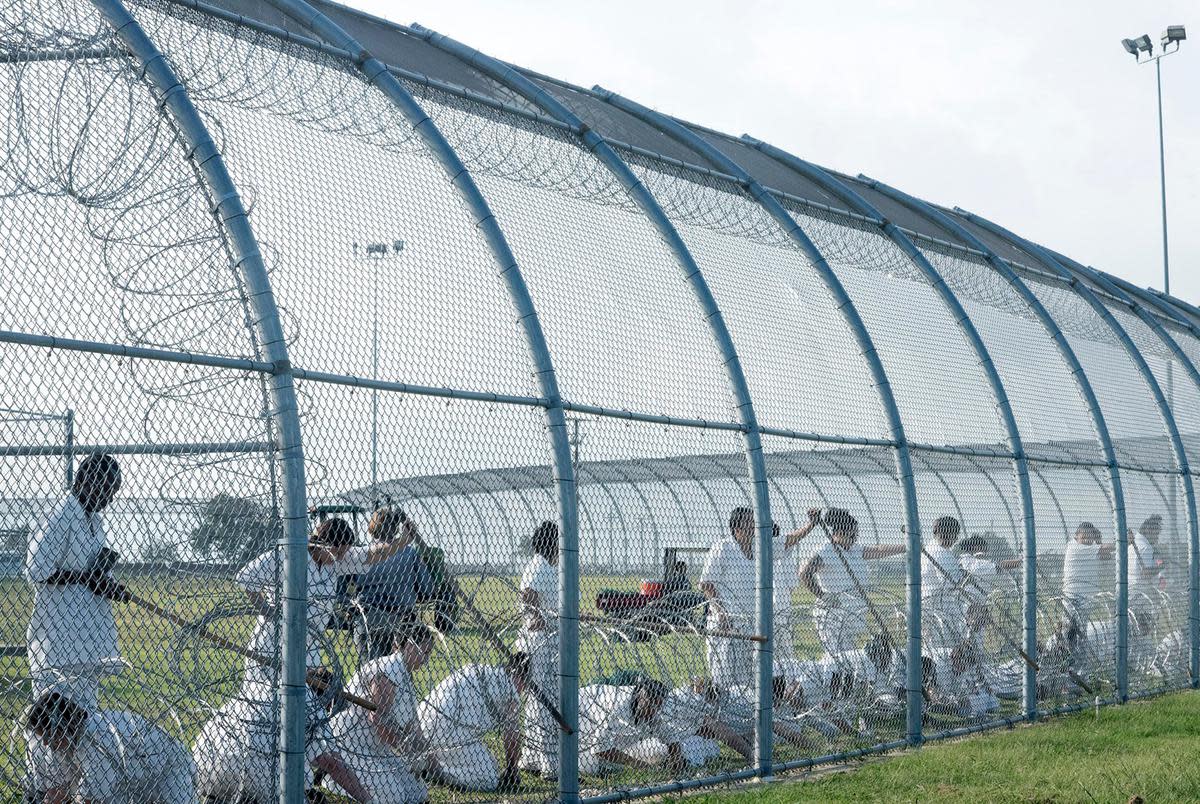 Prisoners work outdoors at the Dr. Lane Murray Unit, a women's prison that's part of the Texas Department of Criminal Justice.