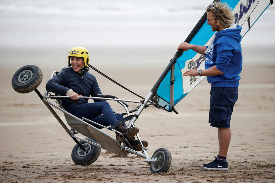 The Duchess of Cambridge land yachting with a group of young carers on the beach at St Andrews. Picture date: Wednesday May 26, 2021.