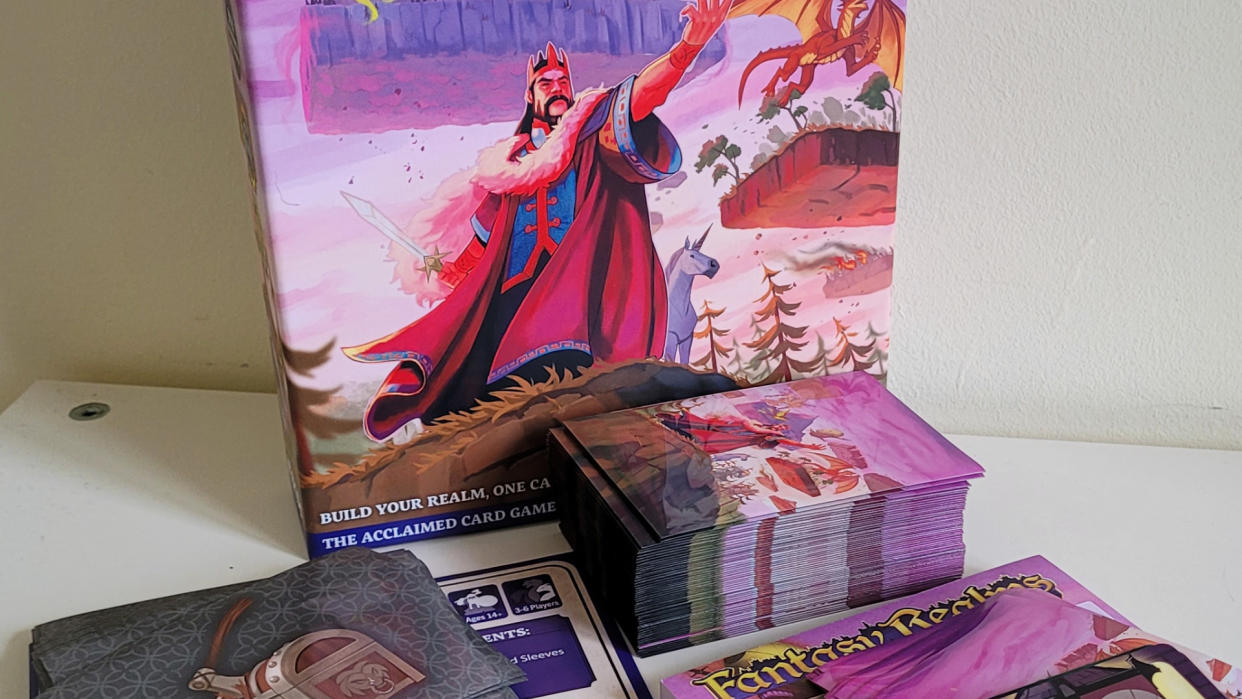  Fantasy Realms Deluxe box and components against a plain wall 