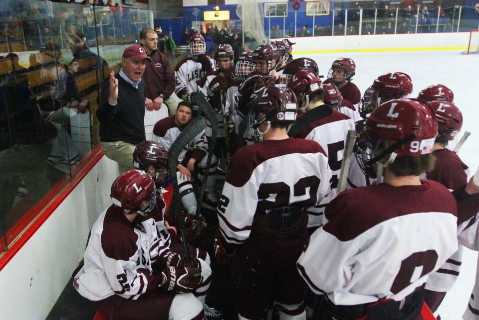 La Salle coach Mike Gaffney talks to his players between periods during a game against Hendricken in January 2015.