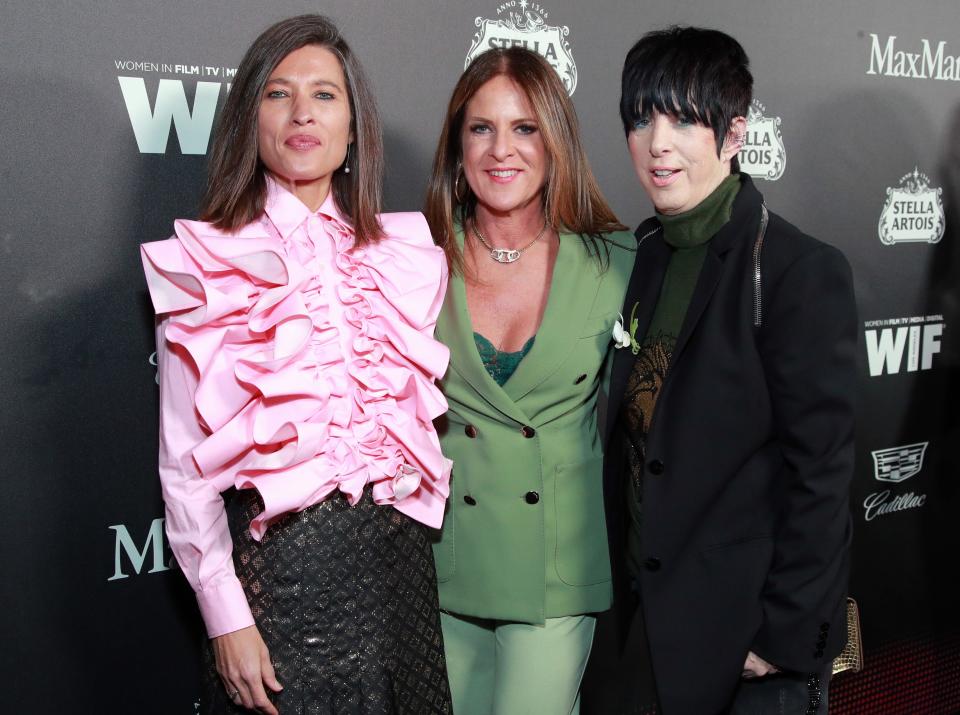 Producer Chelsea Winstanley, far left, Women in Film Board President Emerita Cathy Schulman and songwriter Diane Warren