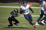 Tennessee Titans running back Derrick Henry (22) goes past Jacksonville Jaguars cornerback Sidney Jones for a 36-yard touchdown during the first half of an NFL football game, Sunday, Dec. 13, 2020, in Jacksonville, Fla. (AP Photo/Stephen B. Morton)