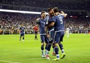 Jun 21, 2016; Houston, TX, USA; Argentina forward Gonzalo Higuain (9) celebrates with forward Ezequiel Lavezzi (middle) and midfielder Lionel Messi (10) after scoring a goal during the second half against the United States in the semifinals of the 2016 Copa America Centenario soccer tournament at NRG Stadium. Kevin Jairaj-USA TODAY Sports