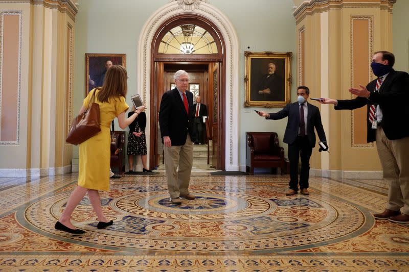 Senate Majority Leader McConnell speaks to members of the news media after departing from the Senate Chamber floor on Capitol Hill in Washington