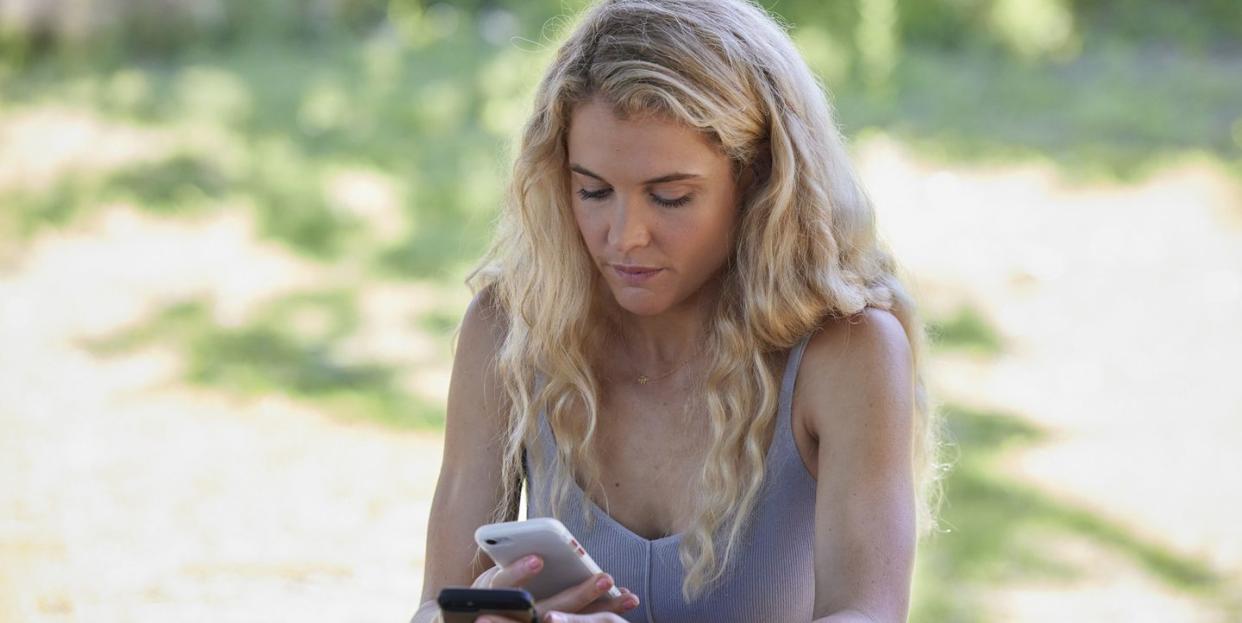 bree cameron with two phones in home and away
