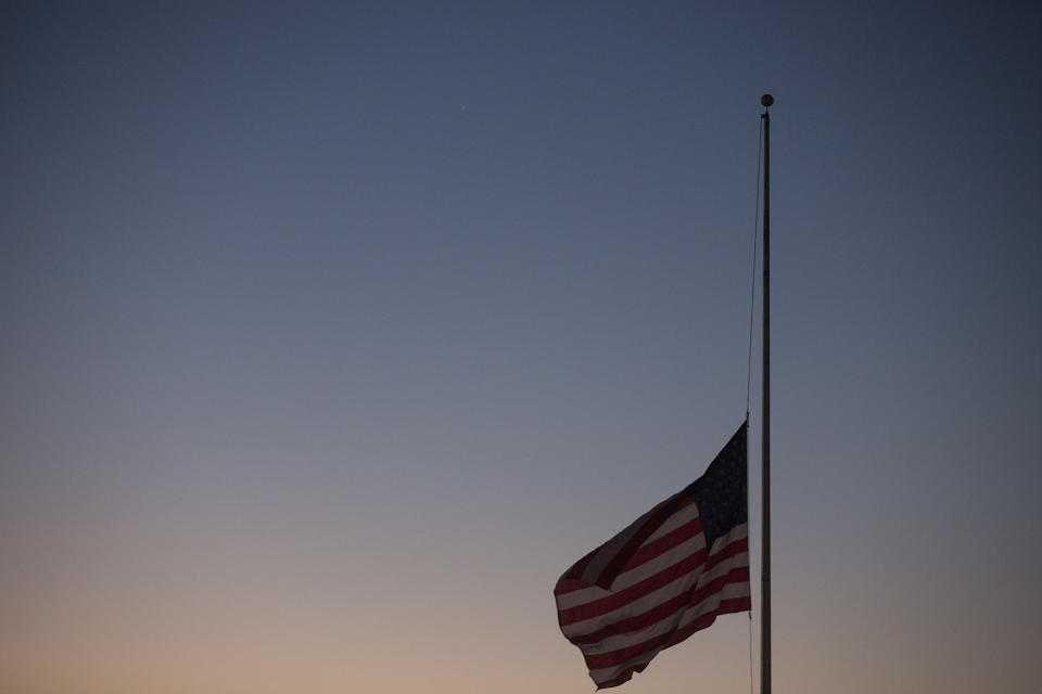 <p>A flag in Draffenville, Ky., less than a mile from Marshall County High School where a 15-year-old student opened fire on fellow students, flies at half-staff at dawn on Thursday, Jan. 25, 2018. (Photo: Ryan Hermens/The Paducah Sun via AP) </p>