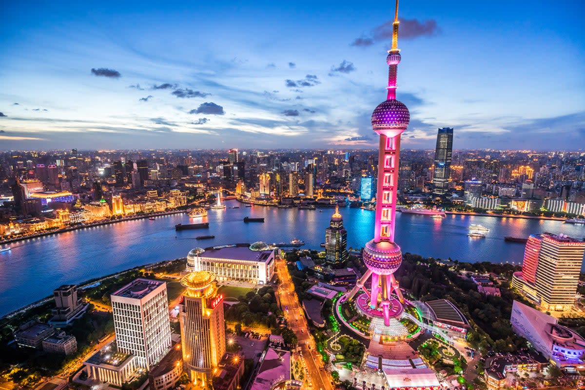 At night, Shanghai’s architecture becomes even more eye-catching  (Getty Images/iStockphoto/Yongyuan Dai)