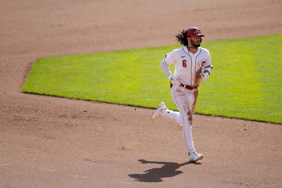 Cincinnati Reds second baseman Jonathan India (6) runs the bases on a 2-run home run hit to the upper deck in left field during the seventh inning of the MLB National League game between the Cincinnati Reds and the Pittsburgh Pirates at Great American Ball Park in downtown Cincinnati on Monday, Sept. 27, 2021. The Reds led 13-1 in the bottom of the eighth.