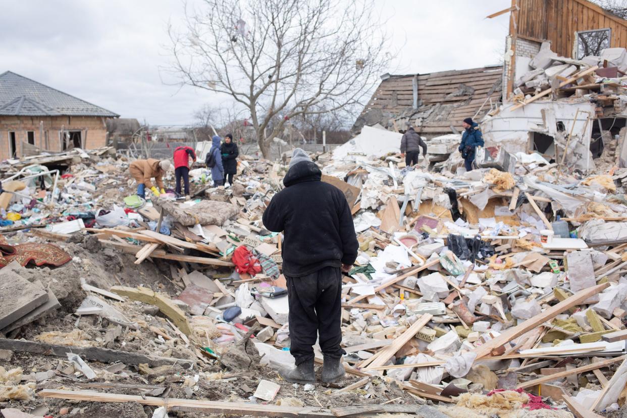 Ihor Mazhayev, 54, stands by his destroyed house on March 5, 2022, in Markhalivka, Ukraine. Ihor lost his wife and 12-year-old daughter and got a concussion as a result of a shelling. Regional police said six people died, including a child, and four were wounded in a Russian air strike on this village southwest of Kyiv.