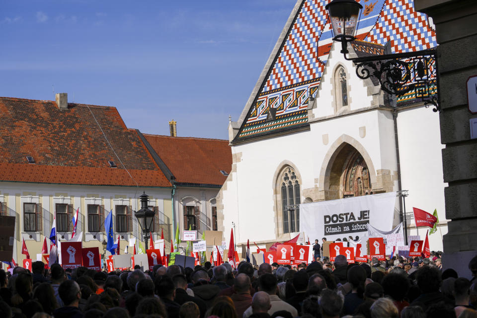 Anti-government protesters gather at the St. Mark square in Zagreb, Croatia, Saturday, Feb. 17, 2024. Thousands have gathered near the government site to denounce corruption related to HDZ ruling party in Croatia. (AP Photo/Darko Bandic)