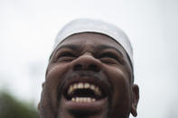 Wagner Luiz Abreu Machado, a priest from the Afro-Brazilian faith Umbanda who goes by Waguinho Macumba, campaigns for a seat on the Sao Goncalo City Council with the Brazilian Social Democracy Party (PSDB) in Sao Goncalo, Rio de Janeiro state, Brazil, Sunday, Nov. 8, 2020. "Running for office is hard enough, but representing the banner of Afro-Brazilian religions is even harder because the banner is replete with prejudices and discrimination," said Machado. (AP Photo/Bruna Prado)