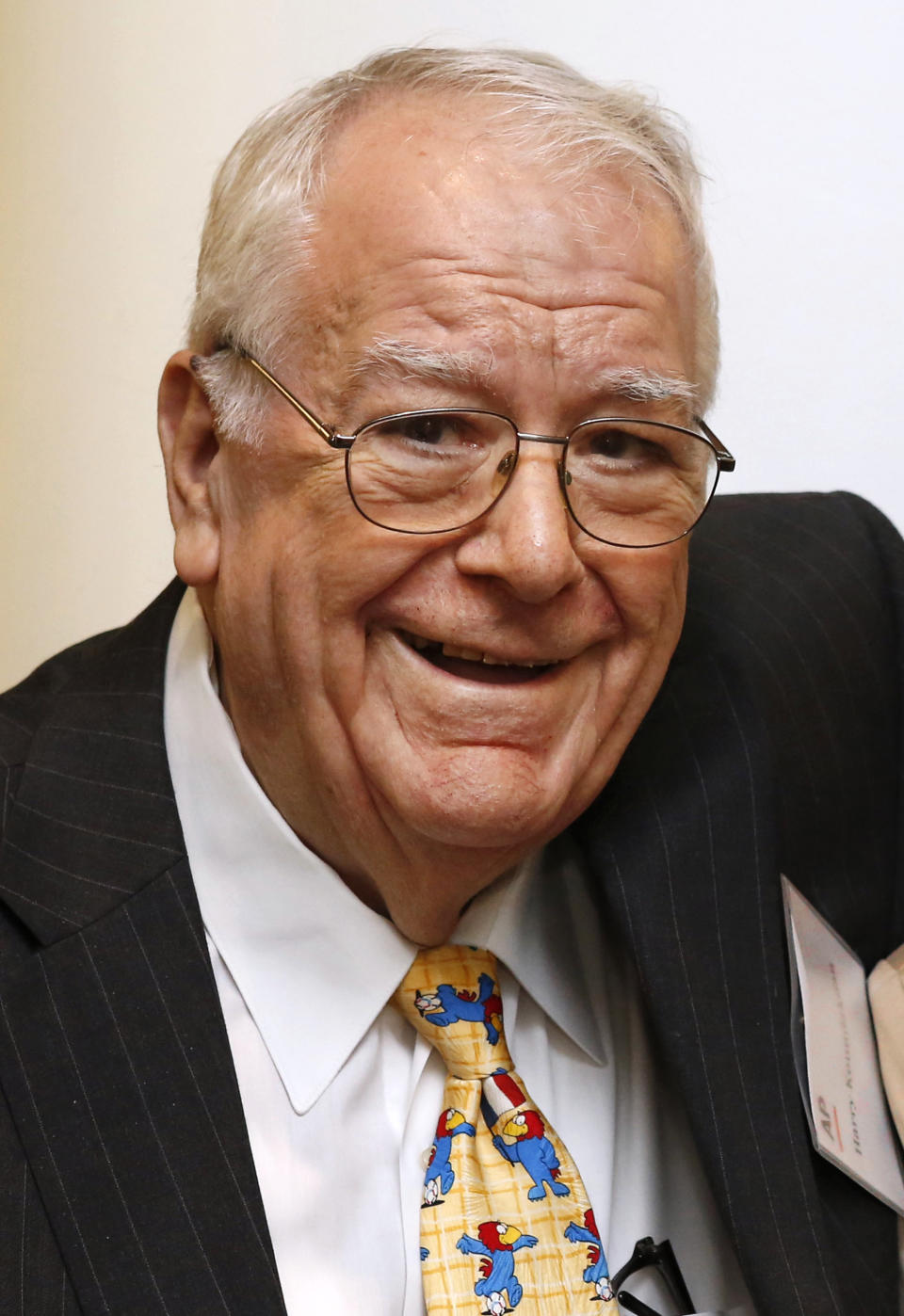 This June 15, 2012 photo shows retired Associated Press photographer and photo editor Harry Koundakjian at the 2012 Alumni Reception at the AP's New York headquarters in New York. Koundakjian died Monday, April 21, 2014, in New York. He was 83. (AP Photo/Stuart Ramson)