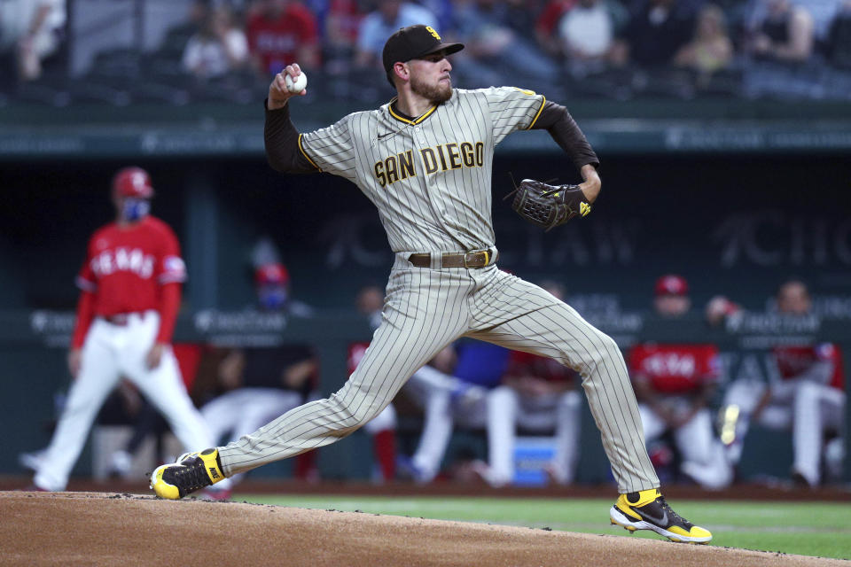 Joe Musgrove, abridor de los Padres de San Diego, hace un lanzamiento en el encuentro del viernes 9 de abril de 2021, frente a los Rangers de Texas (AP Foto/Richard W. Rodríguez)