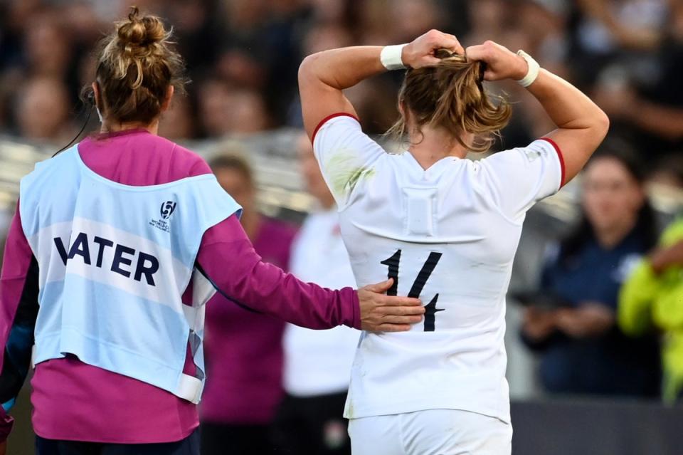 Early blow: England played much of the game with 14 players after Lydia Thompson’s red card (AP)