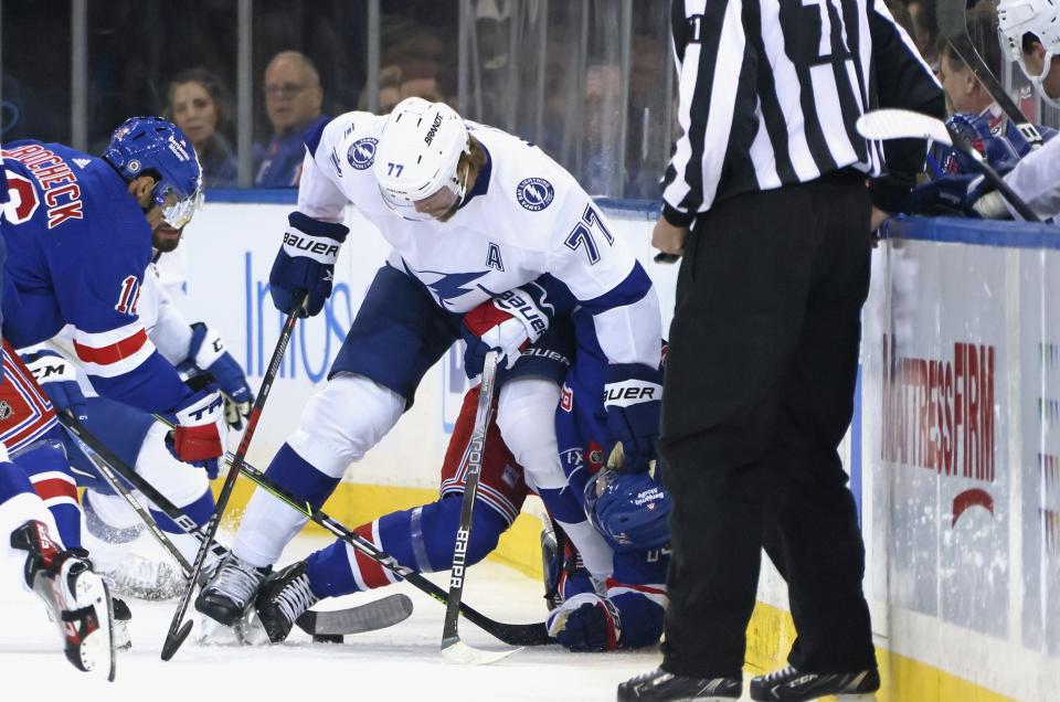 Rangers forward Vitali Kravtsov is injured during the first period on a check by Tampa Bay Lightning defenseman Victor Hedman.